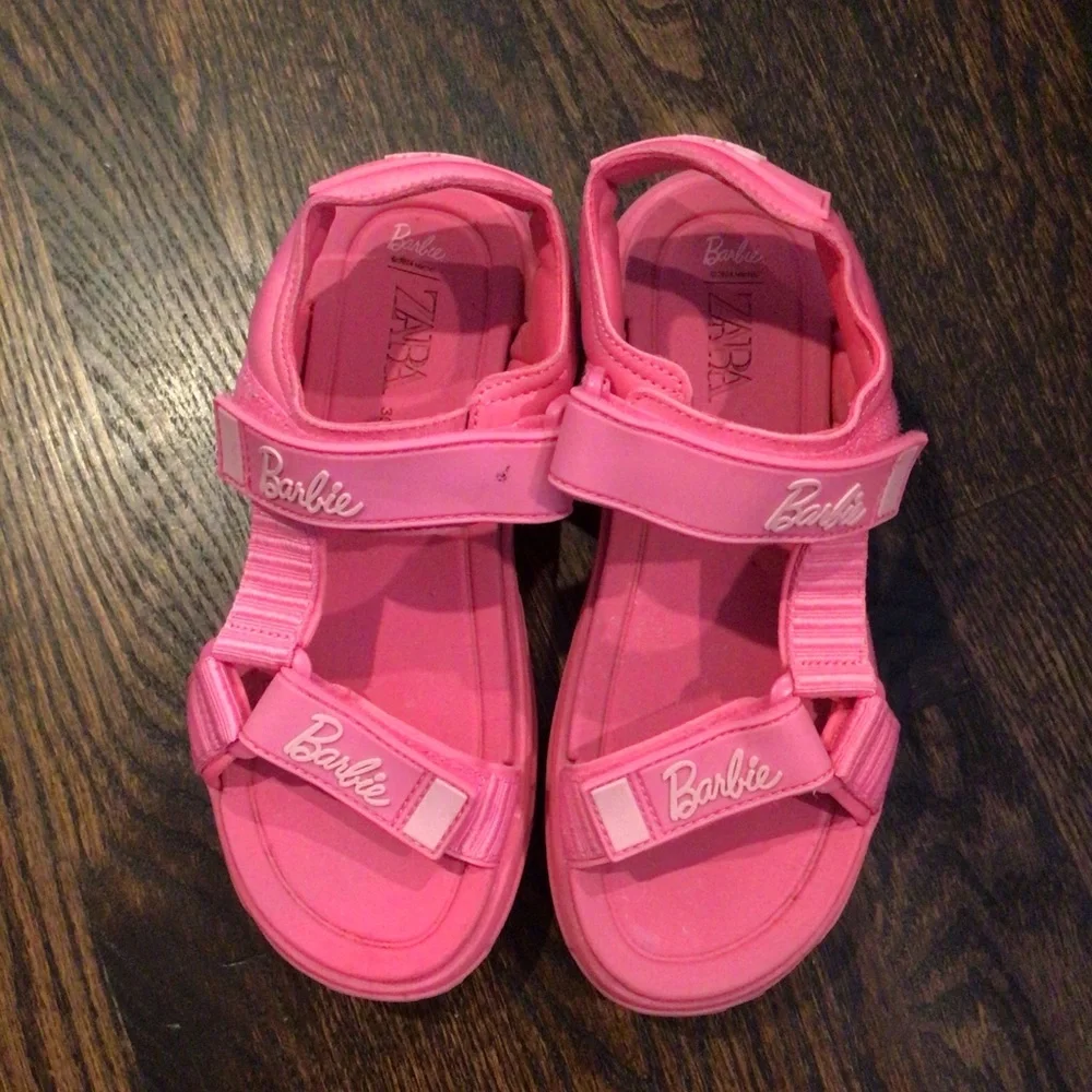 Zara - Barbie sandals, featuring prominent 